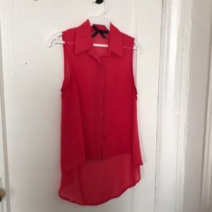 Sleeveless coral colored polyester top with long back for sale!